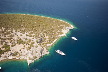 Aerial view of Türkbükü Bay and boats anchored Bodrum Turkey