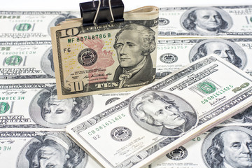 Twenty dollar bills on a background of dollars 