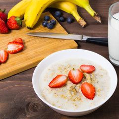 Oatmeal with milk ready for fruit decoration