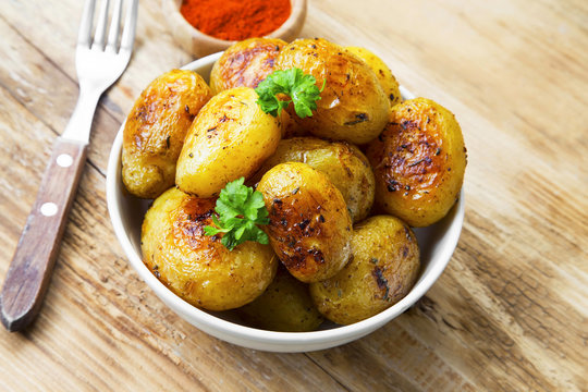 Baked new potatoes in a bowl.Vegetarian healthy meal
