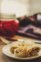 Pancakes with filling (stewed cabbage with vegetables)