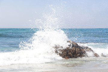 Wave Crashing Rock California