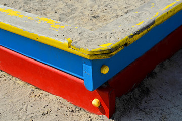 Sandbox, red blue yellow