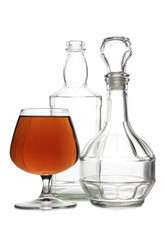 Bottle with brandy and cognac on white background