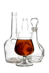 Bottle with brandy and cognac on white background
