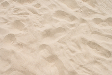 closeup of sand pattern of a beach in the summer