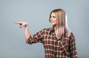 Young woman pointing