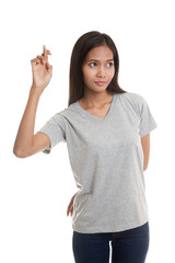 Beautiful young Asian woman cross finger.