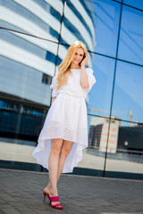 Fototapeta premium portrait of a beautiful girl in the street