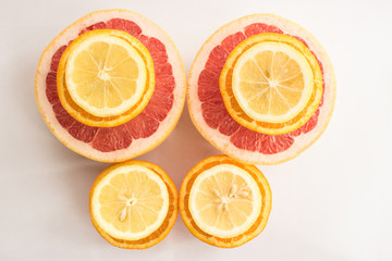 Citrus fruits being cut in half