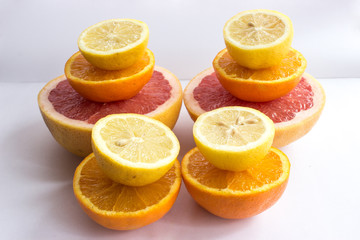 Citrus fruits being cut in half