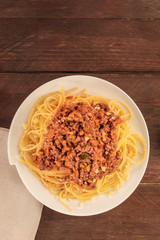 Plate of pasta with meat and tomato sauce