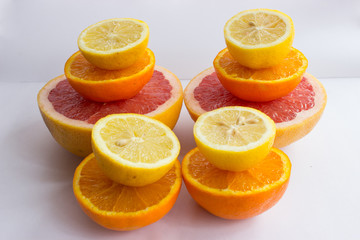 Citrus fruits being cut in half