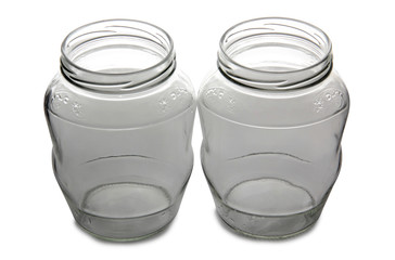 Empty glass jars on white background