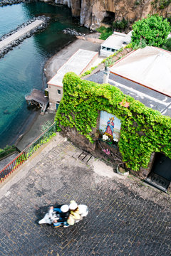 Scooter speeds along coast in Piano di Sorrento