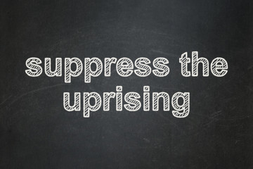 Obraz premium Political concept: Suppress The Uprising on chalkboard background