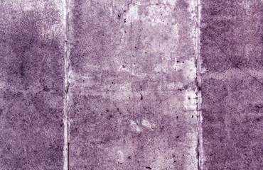 Violet color grungy cement wall surface