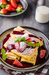Filled pancakes with strawberries