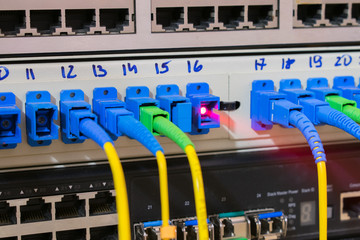 Red laser light from an empty port of patch panel