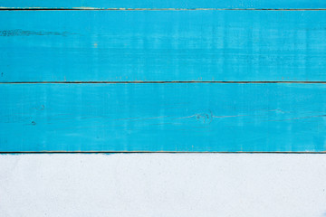 Blank teal blue wood sign with sand border