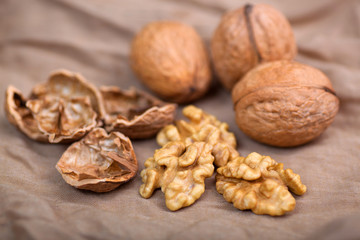 Walnut without shell close-up, and nuts in the shell