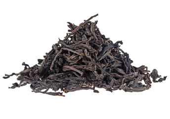 Dry black tea leaves isolated on white background