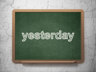 Time concept: Yesterday on chalkboard background