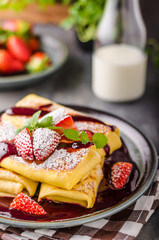 Filled pancakes with strawberries