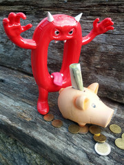 böse null am sparschweinchen