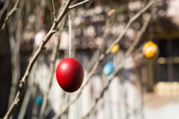 Hand made traditional christian celebration Easter egg with sun