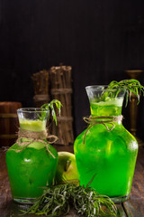 Estragon lemonade. Soft drink with herbs and spices with ice