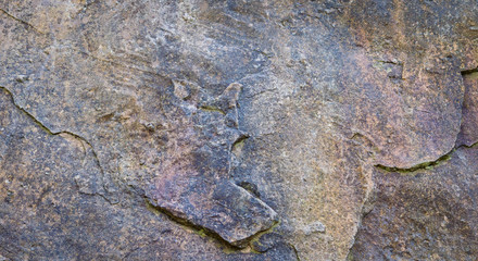 textural background stone surface of multi-colored shades
