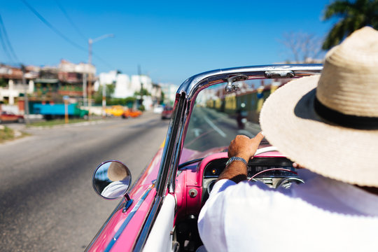 Man drives on a convertible tour of Old Havana in Havana, Cuba