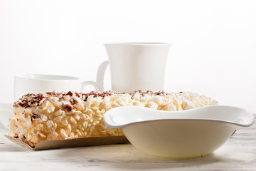 White ware and meringue dessert