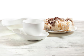 White ware and meringue dessert