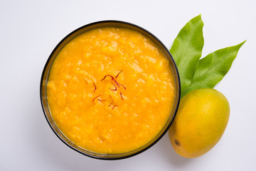 alphonso mango pulp or hapus aam ras or amba ras in marathi, selective focus