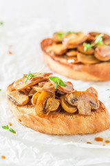 Crisp bruschetta with mushrooms for a snack