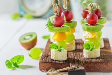 Homemade finger food with various fruits and mint for snack