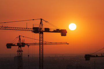 Crane over the urban landscape real estate development