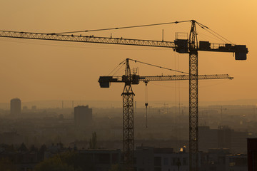 Crane over the urban landscape real estate development