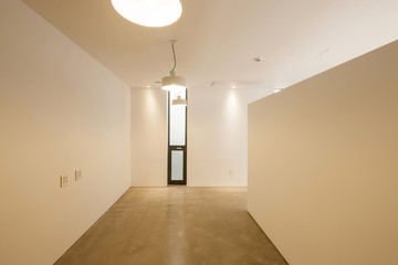 white empty office, showroom with pendant lighting, window.