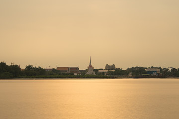 THAILAND, SAMUTPRAKAN, 07 APRIL 2017, Pagoda at riverside with sunset.