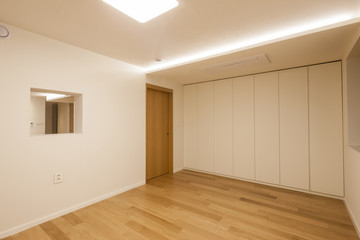 white empty room with wardrobe close for cleaning.