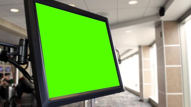 Airport Terminal computer Screen for Boarding Pass Area with Green Screen