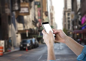 men hands with mobile in the city
