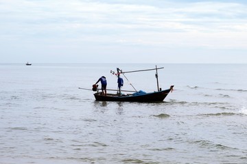 Naklejka premium Wooden fishing boat abstract ocean landscape