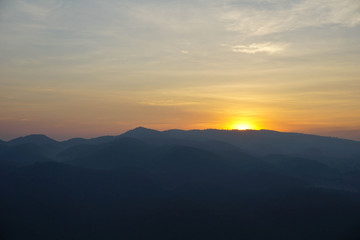 The sun rises in a winter morning