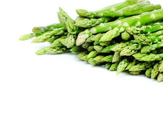 green raw asparagus isolated on white background