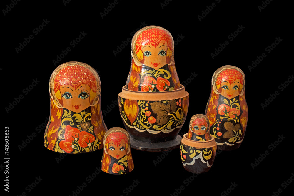 Wall mural Matryoshka Dolls on Black Background with Clipping Path