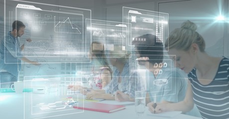 Business people in meeting seen through virtual screen